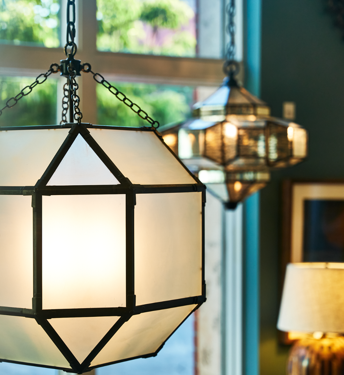 Designer lighting and vintage fixtures at Maude Woods Pasadena, including statement lamps, pendant lights, and chandeliers for inspired interiors.