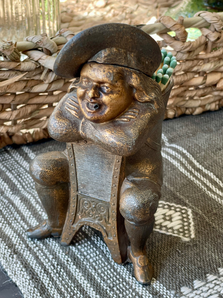 18th Century Cast Iron Match Strike of Man w/Basket