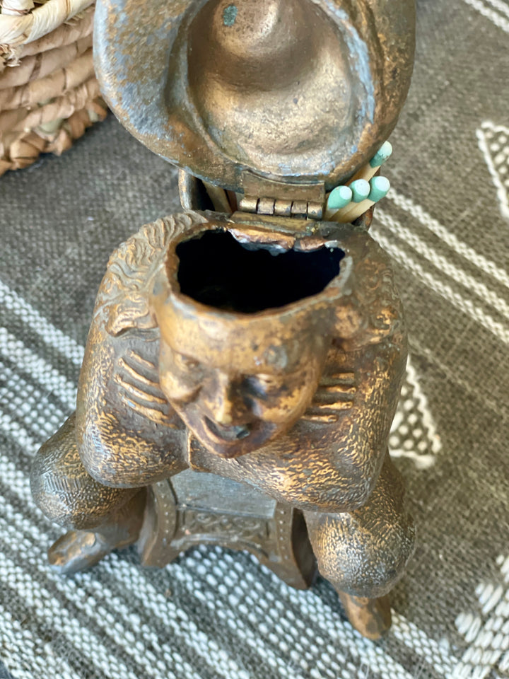 18th Century Cast Iron Match Strike of Man w/Basket