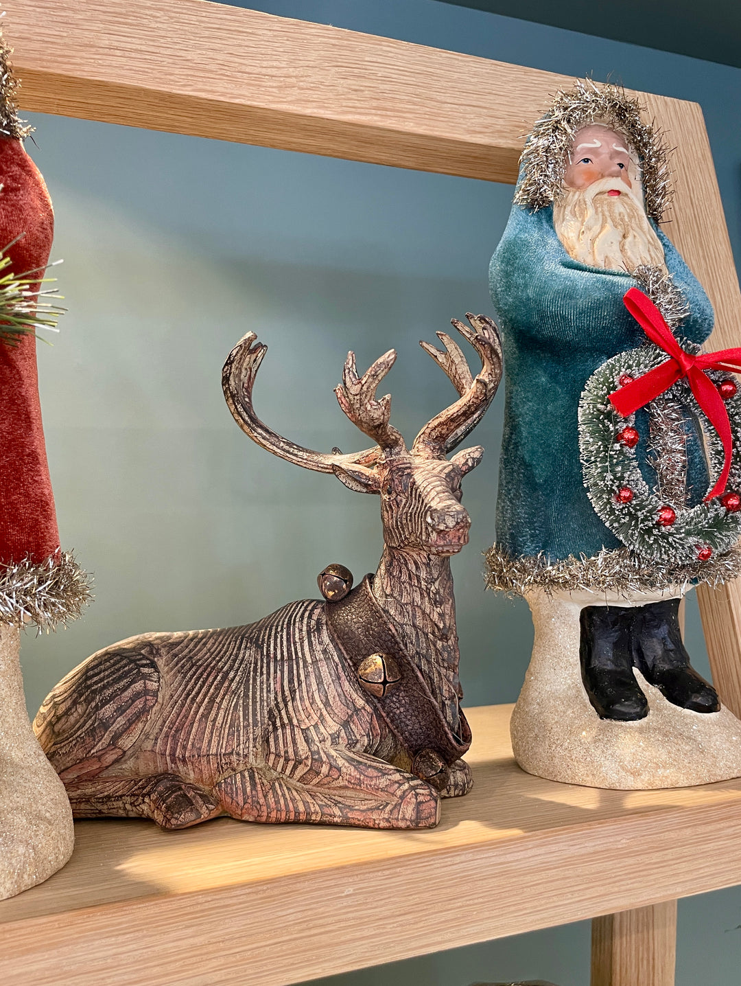 7.5" Carved Resin Sitting Reindeer w/Bell