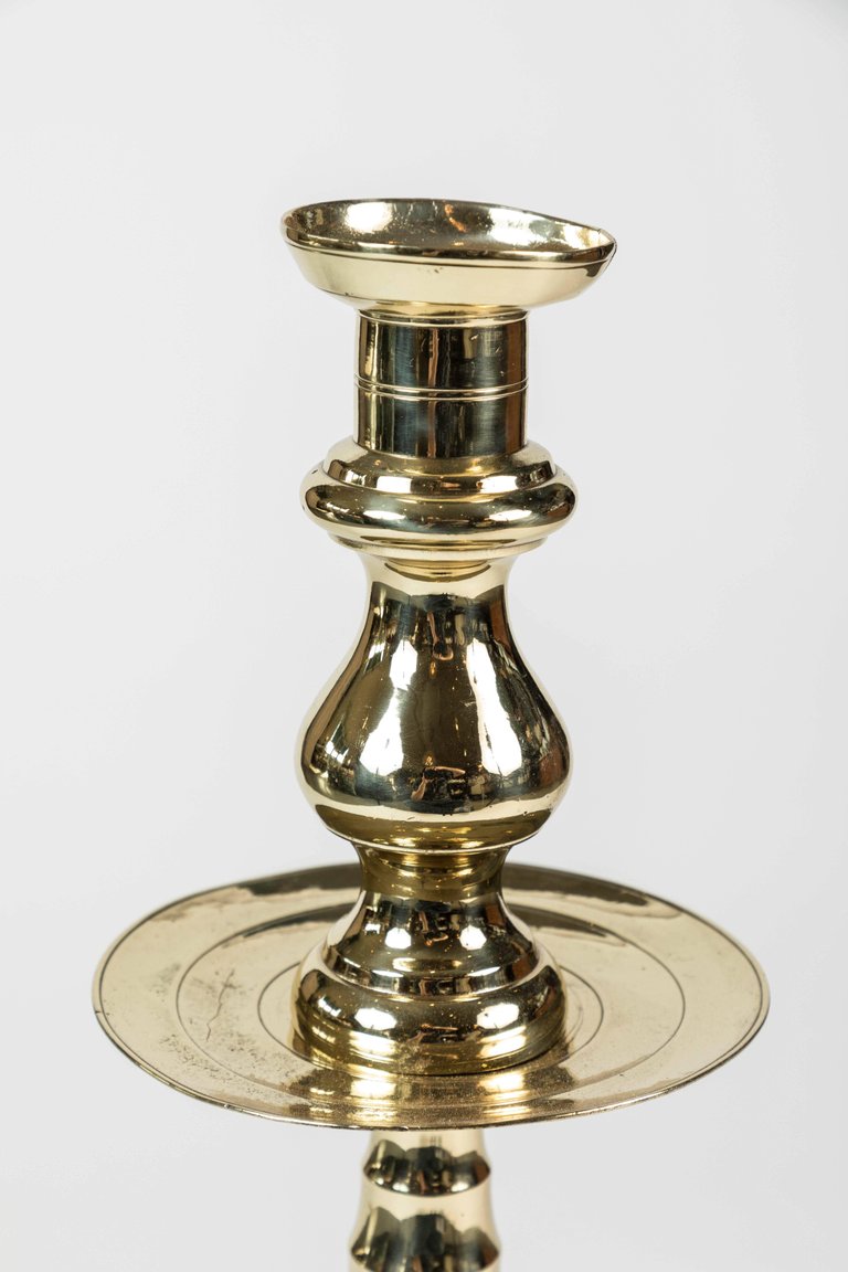 Antique large brass candleholder with beehive pattern stem and base, and simple wax catcher detail, c. 1850-1900