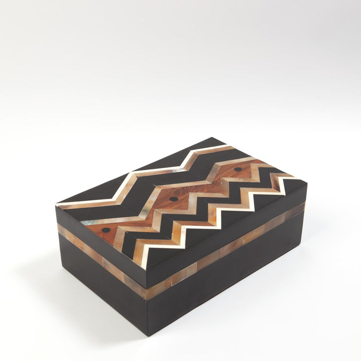 This precisely hand cut horn, bone and wood designed inlay creates a crisp and elegant geometric pattern on the lid/ side of the box.