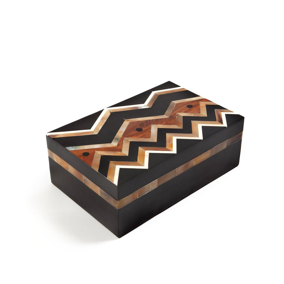 This precisely hand cut horn, bone and wood designed inlay creates a crisp and elegant geometric pattern on the lid/ side of the box.