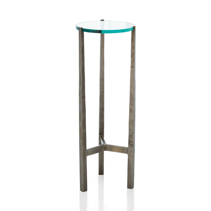 A very petite iron tripod occasional table holds a 1/2 inch thick glass lens.  8.25"DIA. X 23"H